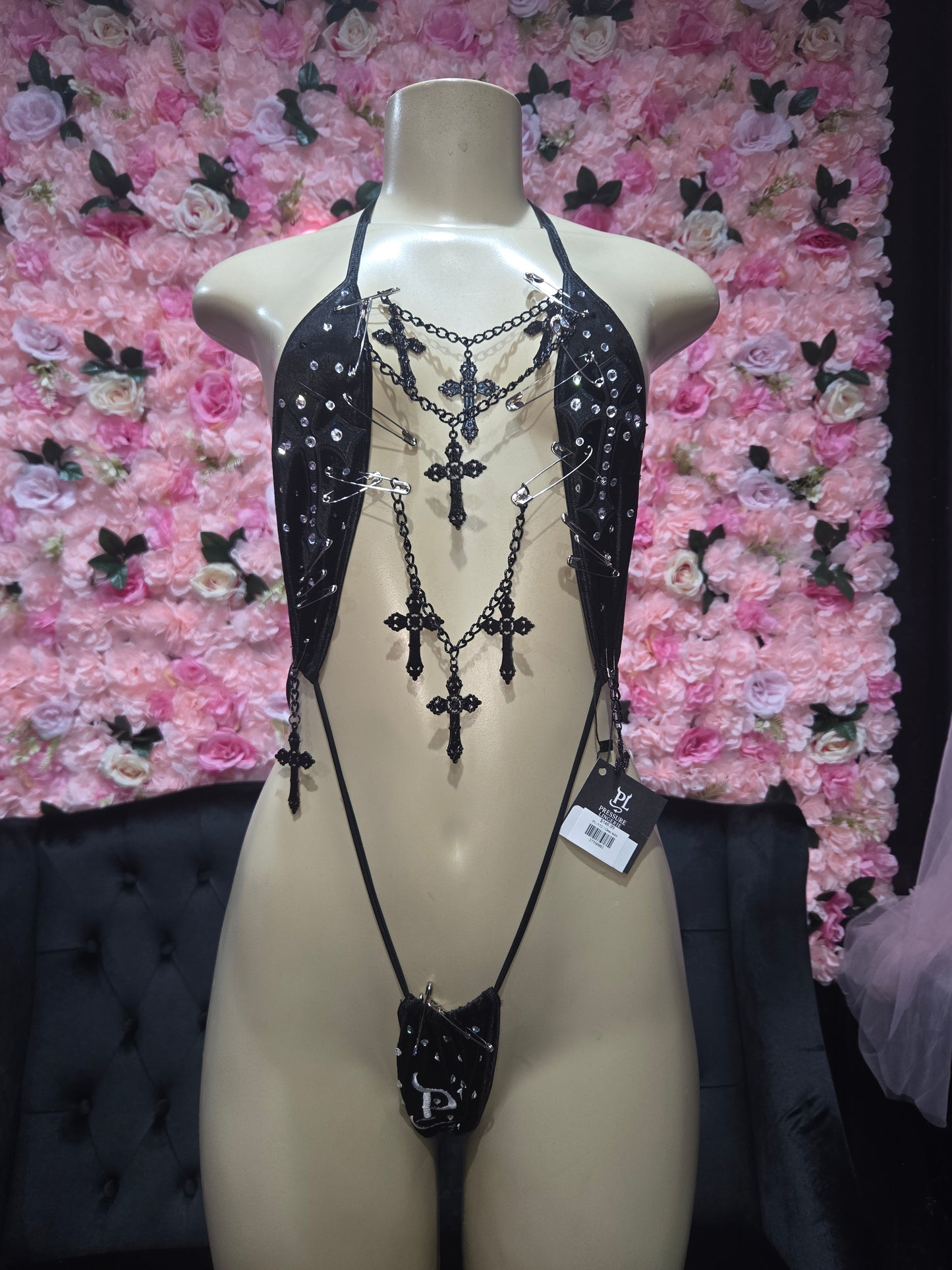 Black suede one-piece Cross patches and charms